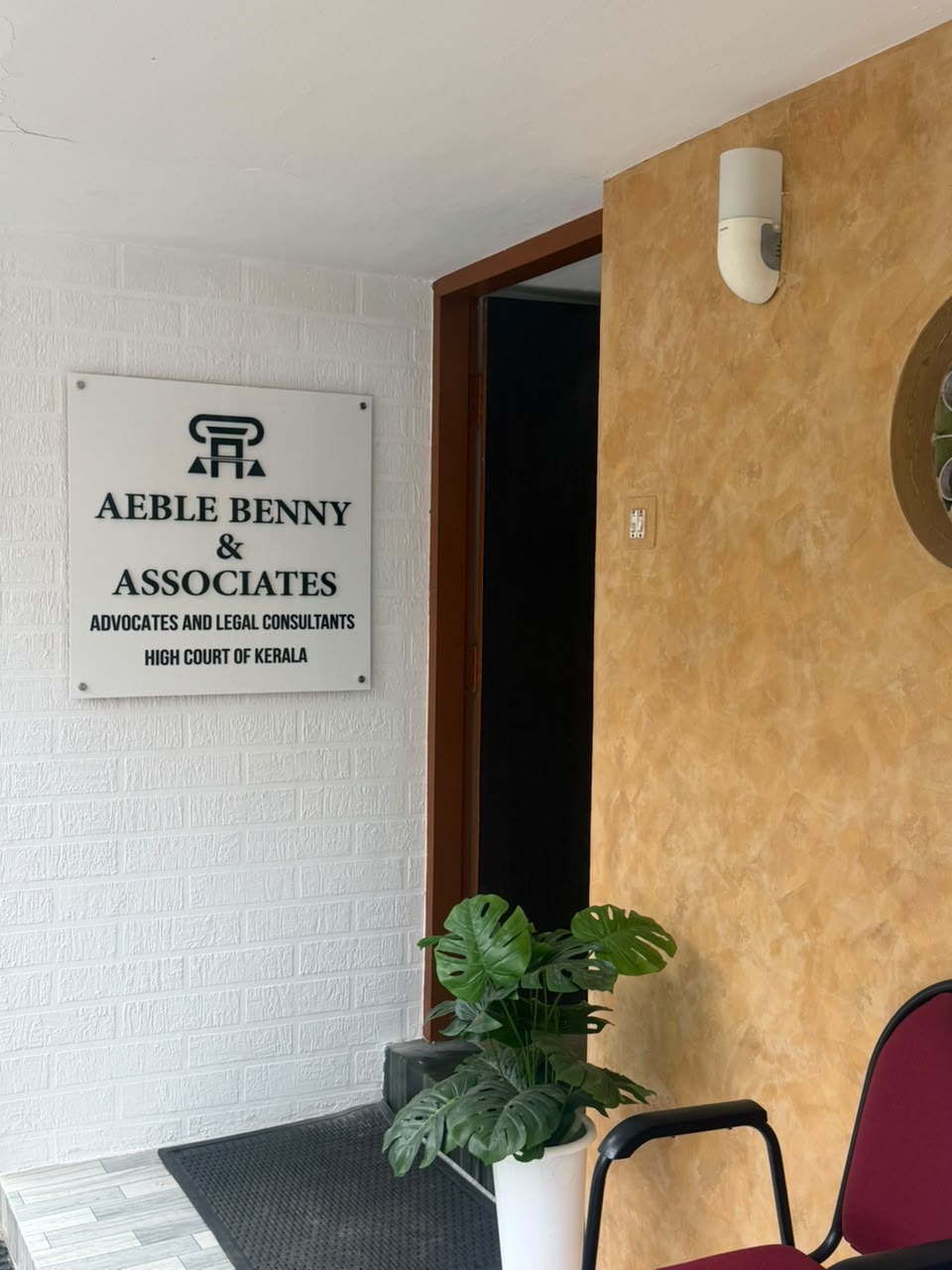 Entrance and signboard of Aeble Benny & Associates